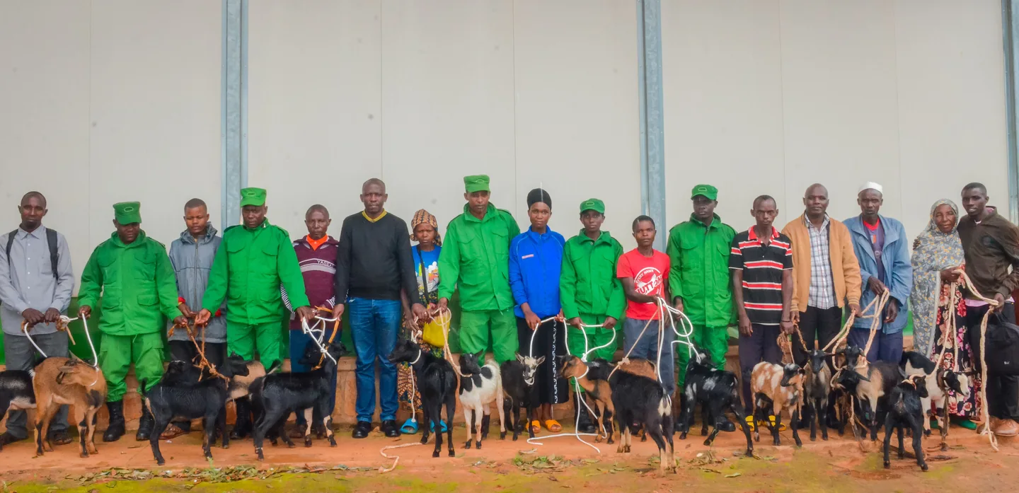 Families receiving small livestock in Gatsibo.